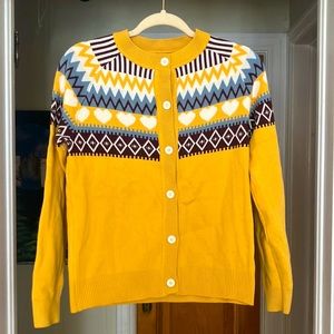 Yellow sweater with patterns . Breathable , size small